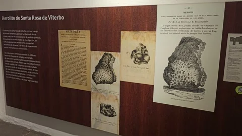 Historic Meteorite Documents and Engravings on Wall Panel, Colombia 8K Stock Footage 331513130