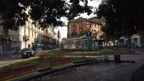 Historic Milan Tram Passing Through NoLo Italy Neighborhood Street Scene with Vídeos de archivo 346600380