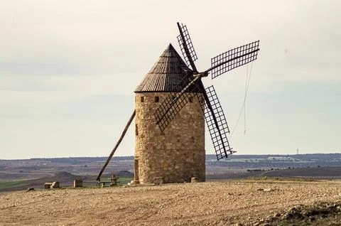 Historic old stone windmill. Stock Photos
