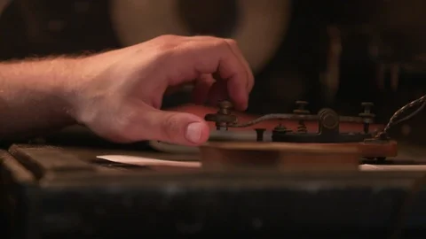 Historic Old Telegraph Technology Operator listens - Morse Code Stock Footage 92446397