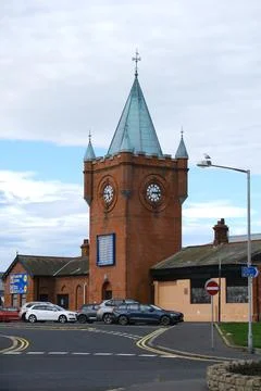 Historic red brick clock tower of the former Belfast and County Down Railwa.. Stock Photos