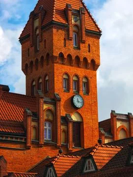 Historic red brick clock tower Stock Photos