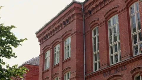 Historic Red Brick Facade of Vahl Skole Elementary School in Oslo Stock Footage 344907699