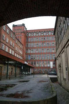 Historic Red Brick Mill, North Mill, Belper, England On A Wet Day. Stock Photos