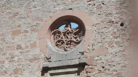Historic Rose Window Detail on Ancient Stone Wall of Limburg Monastery Ruins in Stock Footage 336507392