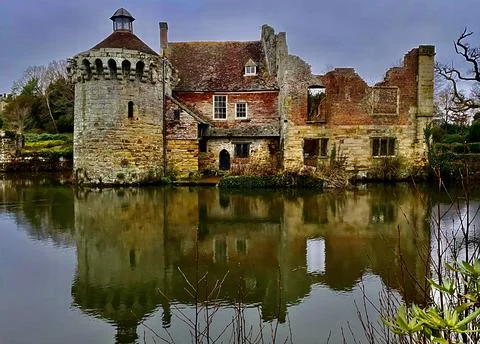 Historic Ruin on a Moat with Dramatic Reflection Stock-Fotos