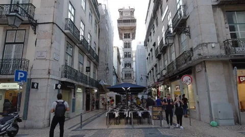Historic Santa Justa Elevator Tower Rising Between Traditional Buildings In.. Video stock 309919470