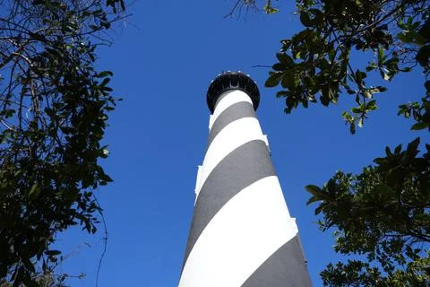 Historic St. Augustine Lighthouse, looking up to the blue Florida sky Stock Photos