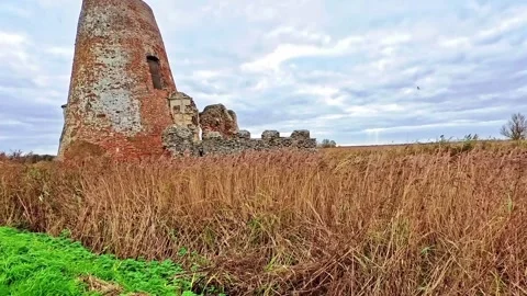 Historic St Benet's Abbey on the River Bank, Norfolk Broads Stock Footage 322996609