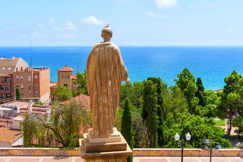 Historic Statue of Emperor Caesar Augustus with Stunning View of Tarragona's Stock Photos