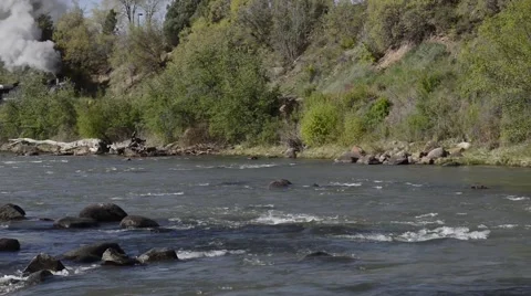 Historic steam train passing river-cropped-HD-P-2247 Stock Footage 40265195