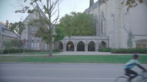 Historic Stone Academic Building with Gothic Arches on University Campus Video stock 332689208
