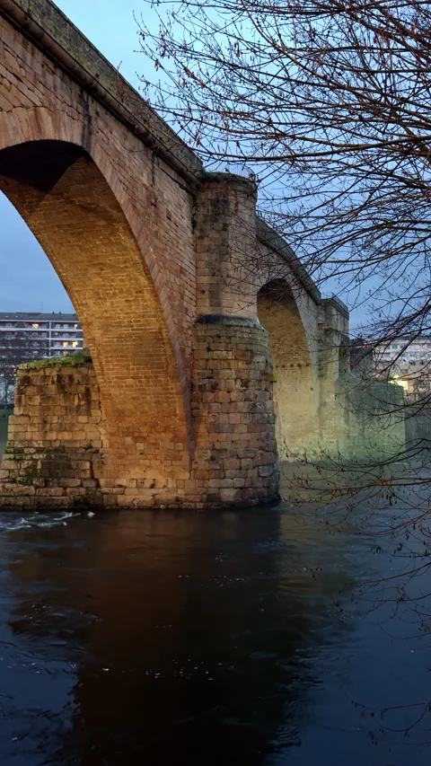 Historic Stone Bridge over River at Twilight Stock Footage 274482350