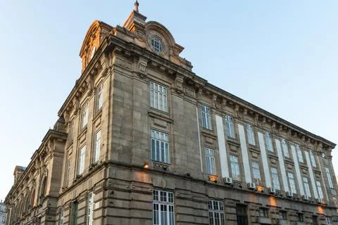 Historic Stone Building Corner with Clock Tower Stock Photos
