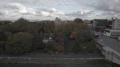 Historic stone tower between trees in park on riverbank Stock-Footage 167893645