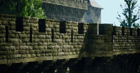 Historic stone wall of a medieval castle standing tall against the blue sky Ilustração Stock