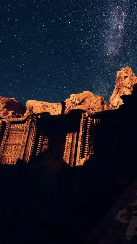 Historic structure stands under a starry night sky in a remote location Video stock 339509785