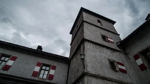 Historic Tower with Red and White Shutters Stock Footage 303906266