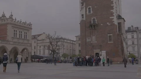 Historic Town Hall Tower in Main Square with Tourists Stock Footage 342559150