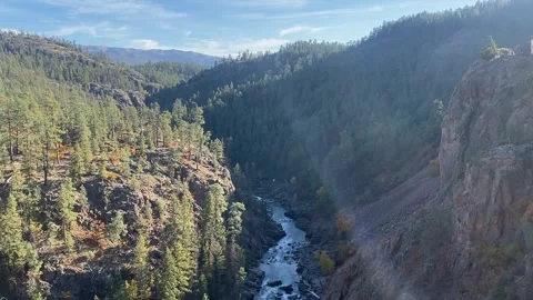 Historic train ride through mountains in fall Stock Footage 274865198