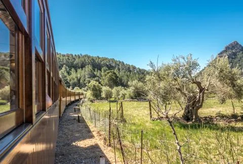 Historic train Tram between Soller and Palma with views over the Soller village Stock Photos