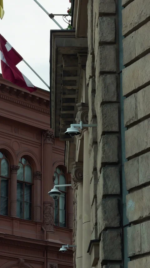 Historic urban facades seen between narrow buildings with stone wall texture Stock Footage 337735143