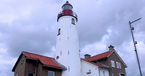 Historic Urk lighthouse in the Netherlands with dramatic sky. Vidéo 271169891