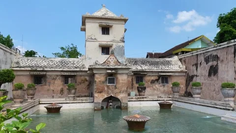 Historic water castle complex with bathing pools and ancient stone architecture. Video stock 342984465