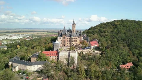 Historic Wernigerode Castle surrounded by an autumn landscape. 4K Stock Footage 274432684