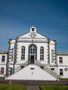 Historic white clock tower building facade Stock Photos