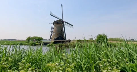 Historic wind mill at UNESCO world heritage site Kinderdijk in the Netherland Stock Footage 271169918