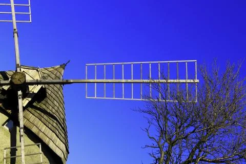 Historic windmill with blue sky Stock Photos
