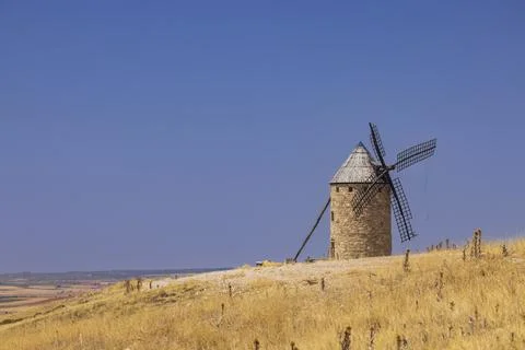 Historic windmill standing on dry hill Mota del Cuervo Stock Photos