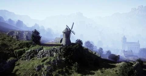 Historic windmill stands on a hill surrounded by misty mountains at dawn Stock Illustration