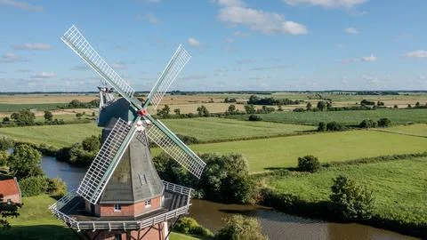 Historic Windmill Surrounded by Flat Countryside from Above Stock Photos