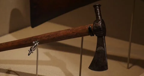 Historical artifact display at the museum featuring a unique axe Video stock 281704946