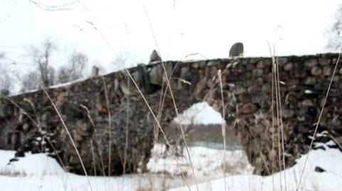 Historical boulder bridge over a riverbed Stock Footage 61328045