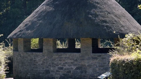 Historical Celtic Thatched Stonework building in St. Fagans in South Wales Stock Footage 118885053