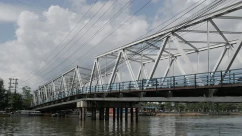 Historical Coen-Dewi bridge over the Martapura river, Banjarmasin Stock Footage 136430591