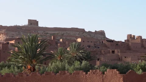 Historical complex of Ait Ben Haddou and palm tree, Morocco near Ouarzazate. Old Stock Footage 130577332