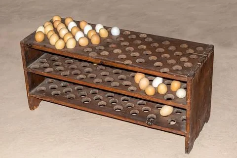 Historical egg stand rack from the 19th century Stock Photos