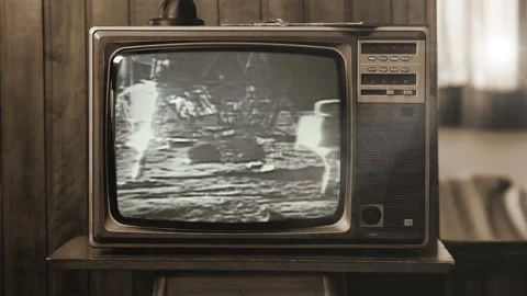 Historical Footage of the NASA Apollo 11 Moon Landing On an Old Retro TV. Stock Footage