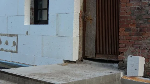 Historical house wall insulation with polystyrene Stock Footage 124700831