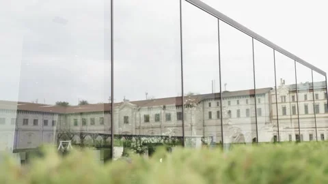 Historical Moldovan Palace Reflected in Windows During the Day Stock Footage 300487549
