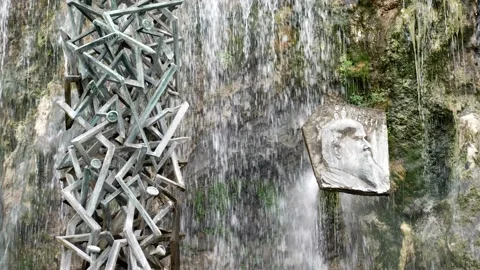 Historical monument with waterfall background.Slow motion 4K Video stock 155247694