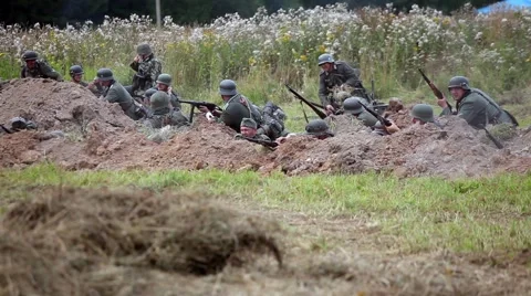 Historical reconstruction of the Second World War. Soldiers on the battle field Stock Footage 64754371