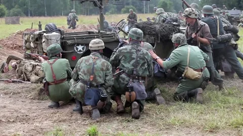 Historical reconstruction of the Second World War. Soldiers on the battle field Stock Footage 64754411