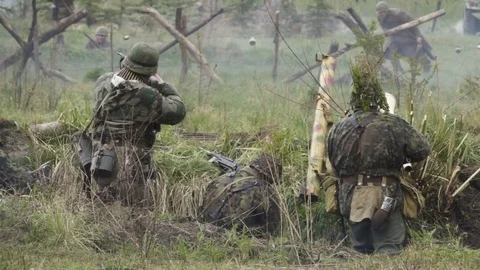 Historical reconstruction of Second World War. Soldiers on battle field durin Video stock 82068229