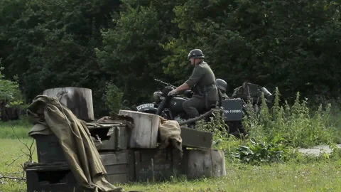 Historical reconstruction of Second World War. Soldiers on battle field during Stock Footage 102521857