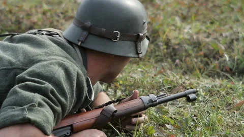 Historical reconstruction of Second World War. Soldiers on battle field during Stock Footage 102523315
